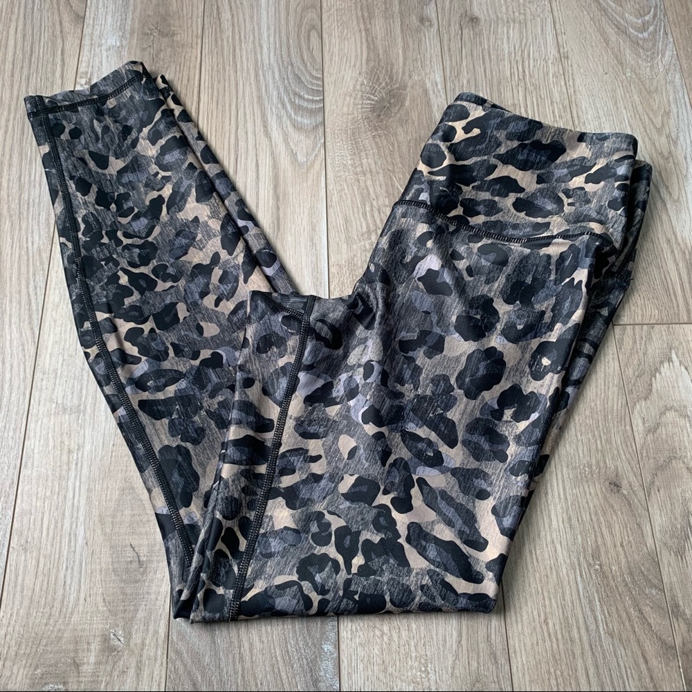 EUC Playground animal print leggings large